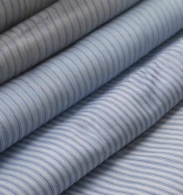 Rolls of blue and white striped shirting cotton