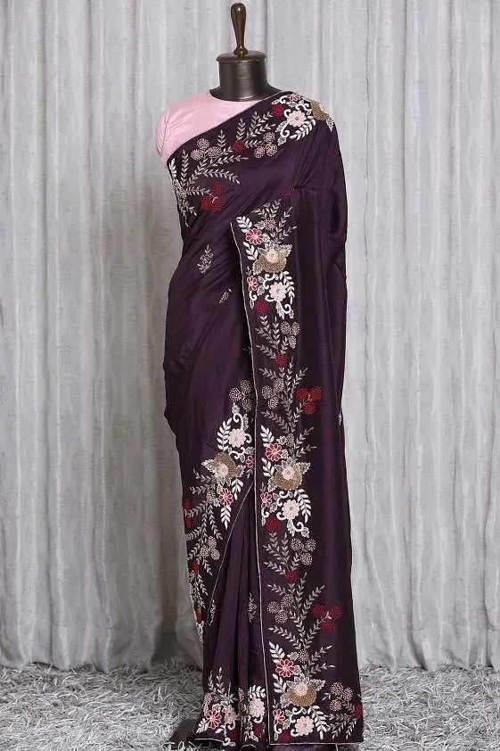 Wine silk saree with floral embroidery on the pallu